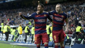 MADRID, SPAIN - NOVEMBER 21:  Neymar JR. (L) of FC Barcelona celebrates scoring their second goal with teammate Andres Iniesta (R) during the La Liga match between Real Madrid CF and FC Barcelona at Estadio Santiago Bernabeu on November 21, 2015 in Madrid, Spain.  (Photo by Gonzalo Arroyo Moreno/Getty Images)