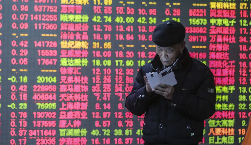 HANGZHOU, CHINA - JANUARY 05:  (CHINA OUT)Investors watch a digital screen displaying the prices of China's stock marketon January 5, 2015 in Hangzhou, Zhejiang province of China. China's stock surged to a high position on the first trading day of 2015, with Shanghai Composite Index climbing 3 percent to 3,350.52 at the close in the afternoon trading session on Monday.  (Photo by ChinaFotoPress/ChinaFotoPress via Getty Images)