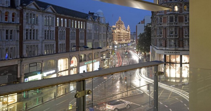 Balcony view at dusk looking towards Harrods, One Hyde Park, Luxury Flats, Europe, United Kingdom, 2011, Rogers Stirk Harbour + Partners. (Photo by View Pictures/UIG via Getty Images)